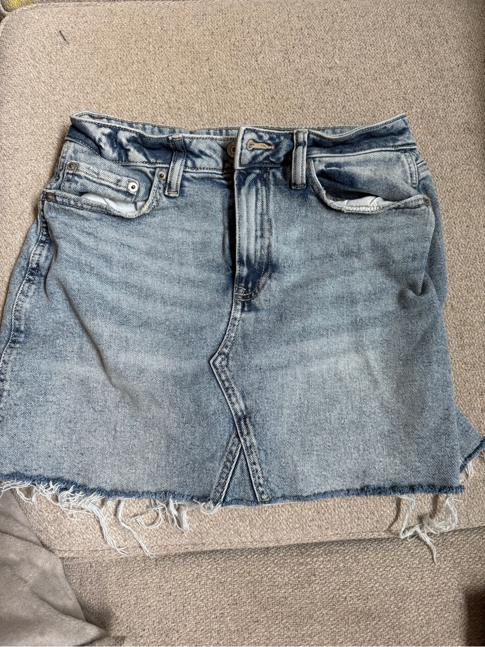SO Light Blue Denim Mini Skirt with Raw Hem